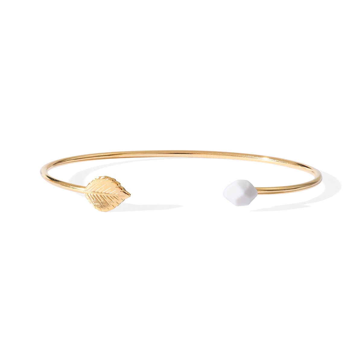 Bracelet Sunset feuille en porcelaine et métal
Photo Di Messina